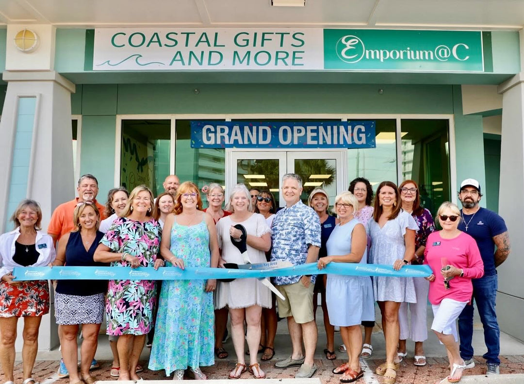 grand opening ribbon cutting with group of people