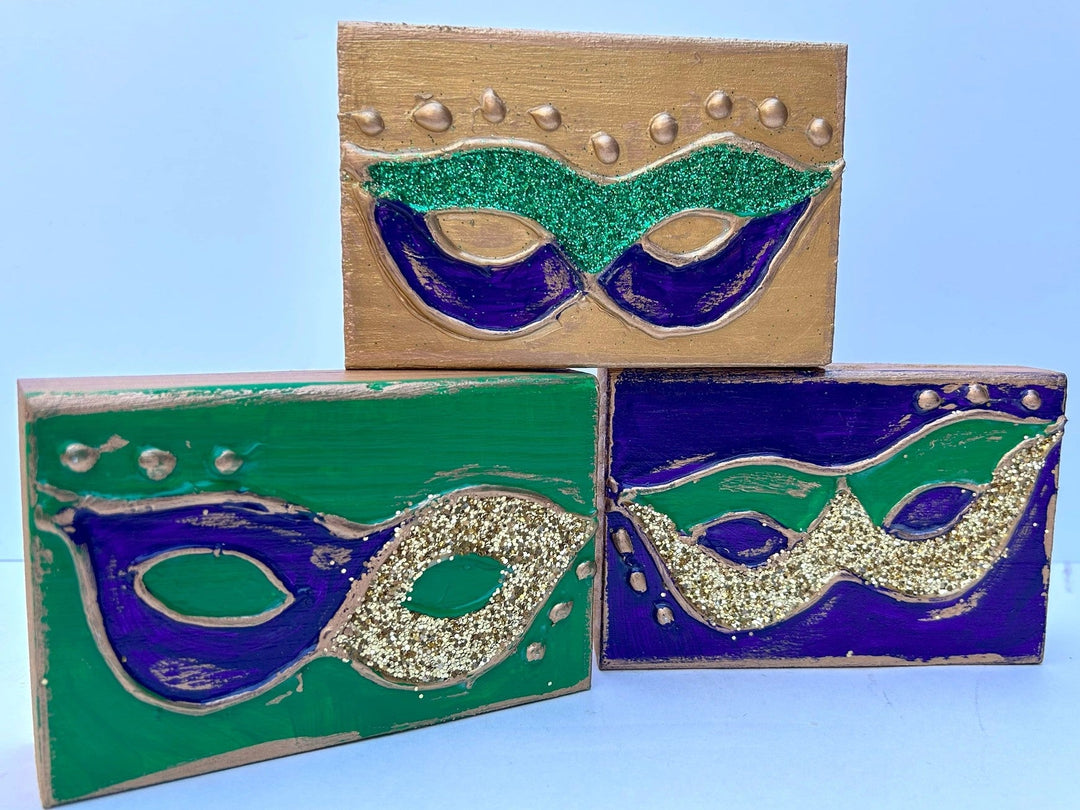 mardi gras purple, green, and gold mask art