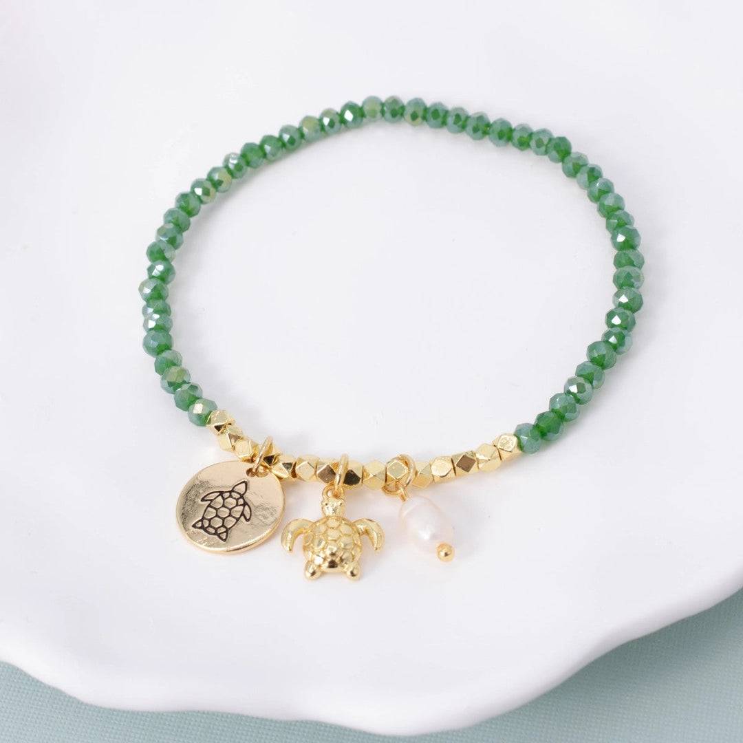 splendid iris gold & green stretch charm bracelet