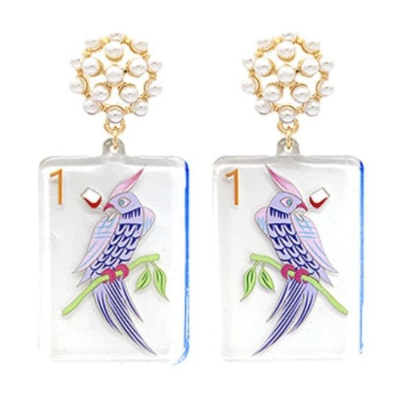 Pair of earrings with mahjong bird design on a white background