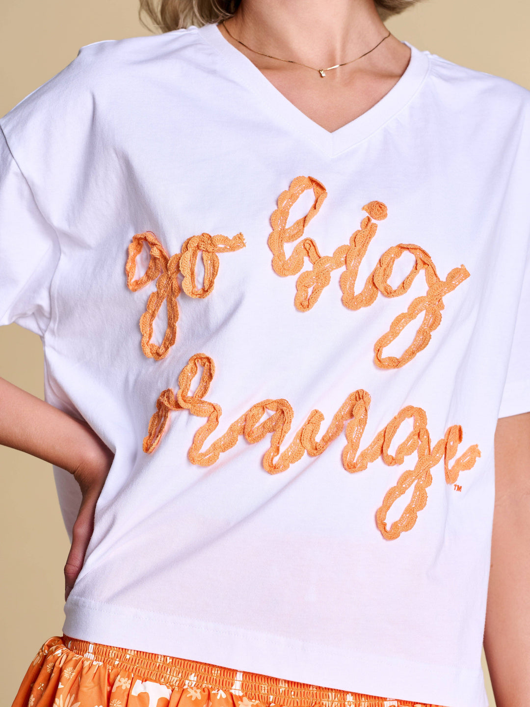 orange and white ruffle skirt