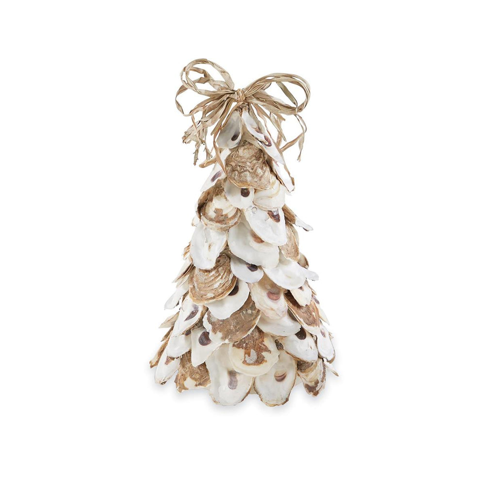 A cone-shaped decorative tree made from layered natural oyster shells in white, tan, and brown tones, topped with a tied raffia bow, displayed against a white background.