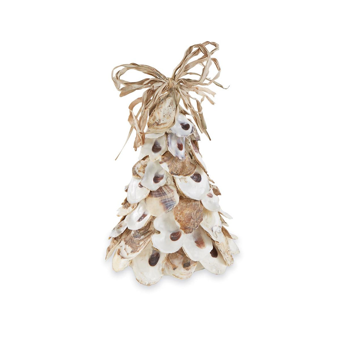 A cone-shaped decorative tree made from layered natural oyster shells in white, tan, and brown tones, topped with a tied raffia bow, displayed against a white background.