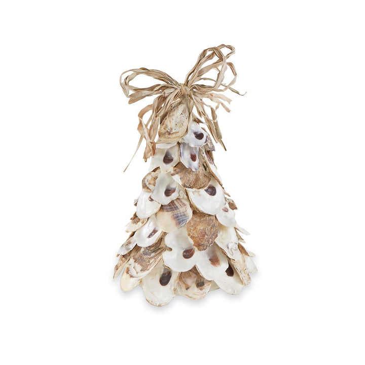 A cone-shaped decorative tree made from layered natural oyster shells in white, tan, and brown tones, topped with a tied raffia bow, displayed against a white background.
